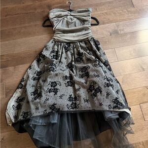 Elegant Strapless Dress with Black Floral Design